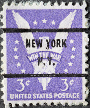 USA - Circa 1942: a postage stamp printed in the US showing the picturing the American eagle. Text: Win the War. New York