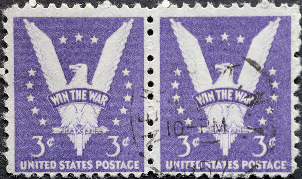 USA - Circa 1942: a double postage stamp printed in the US showing the picturing the American eagle. Text: Win the War
