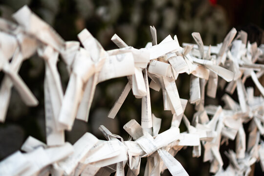 Fushimi Inari Shrine, Kyoto, Japan, Omikuji (Japanese fortune-telling paper strips)