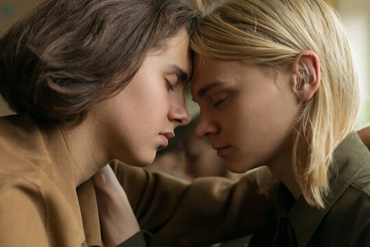 two gays snuggled together