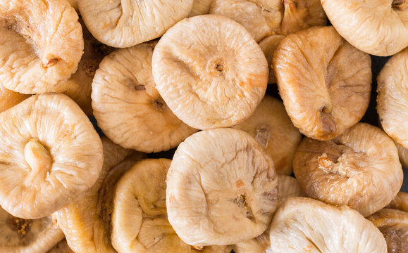 Dried figs on a gray background