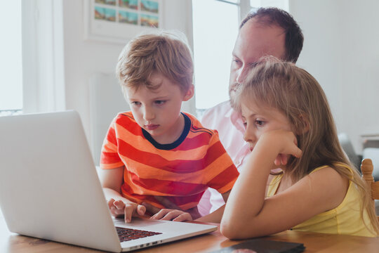 homeschooling, children using computer to learn, home education