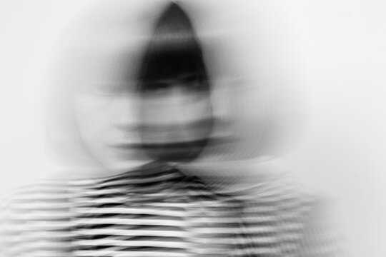 strong personality, bravery, portrait of woman with motion blur