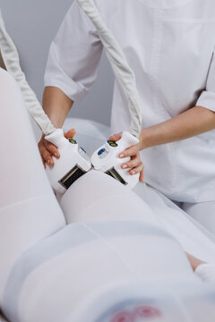 Beautician making skin treatment.