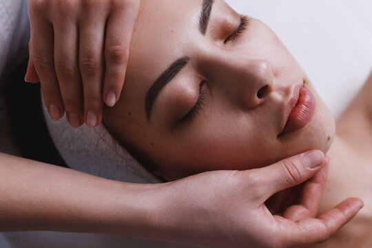Facial massage at spa centre