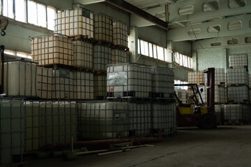 Warehouse full of cube tank on pallets