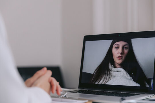 Doctor providing online session of therapy
