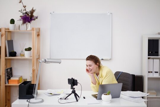Office worker talking with colleagues