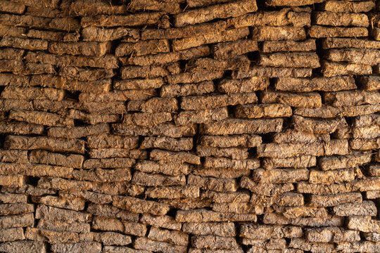 Pile of dried manure in Traditional village in Dagestan, Caucasus mountains, Russia