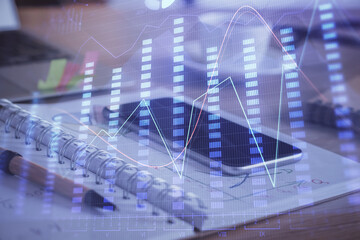 Double exposure of forex chart drawing and cell phone background. Concept of financial data analysis