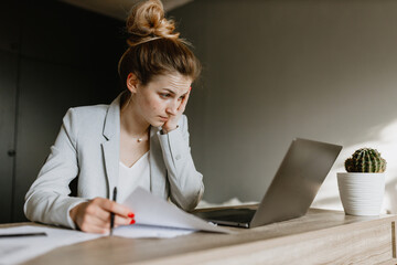Office worker staying and working at home during quarantine