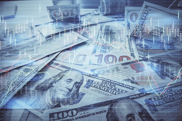Multi exposure of forex chart drawing over us dollars bill background. Concept of financial success markets.