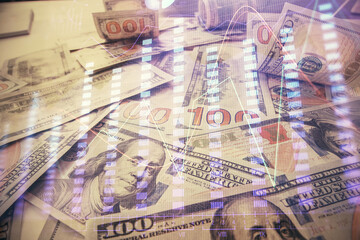Multi exposure of forex chart drawing over us dollars bill background. Concept of financial success markets.