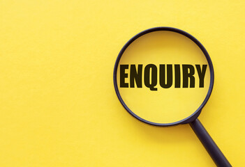 The word enquiry is written on a magnifying glass on a yellow background.