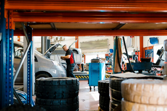 Mechanic repairing car in auto repair shop