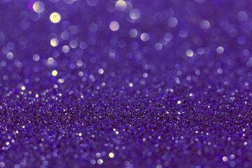Abstract purple blue background with bokeh effect. Blurred glitter.