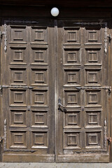 Wooden door of Church of the Sacred Heart of Jesus in Stegna, Poland.