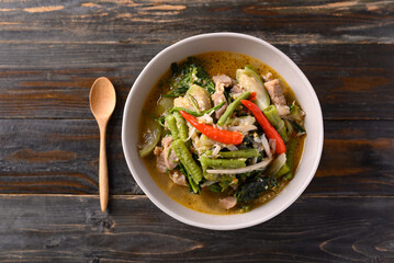 Northern Thai food (Kaeng Khae), Spicy curry soup with pork and mixed local vegetables and herbs,...