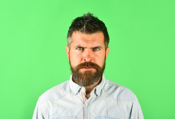 Angry man. Serious bearded man looking at camera. Portrait of serious man. Isolated.