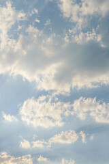 Blue sky with fluffy white cloud and sunlight, Nature background