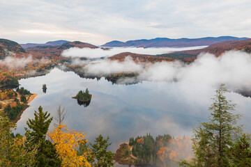 Mont-Tremblant Park Vista of Mont-Tremblent Park in an early autumn morning with fogs hovering...