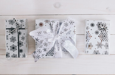 Christmas Decorations and a Gift Box. Christmas White background. Flat lay.