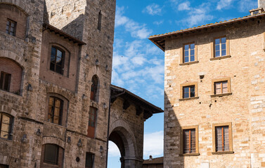 Windows and old buildings in San Gimignano. Tuscany, Italy.