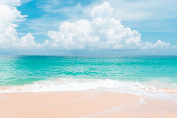 Tropical nature clean beach and white sand in summer with sun light blue sky and bokeh background.