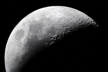 Waxing crescent / The Moon is a gravity rounded astronomical body orbiting Earth and is the planet's only natural satellite. It is the fifth-largest satellite in the Solar System