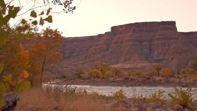 Panning the desert landscape during Fall in Utah along the Green River.