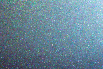Full frame macro abstract background of sparkling light denim blue color glitter texture, with copy space