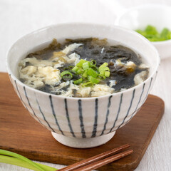 Taiwanese food - Homemade delicious seaweed egg drop soup in a bowl on a serving tray.