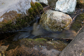 Obraz premium Stream flowing in the mountains outdoors in summer
