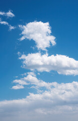 Blue sky and white clouds in the sky on a sunny day