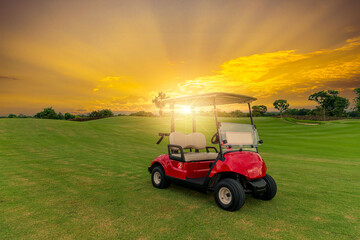 golf cart park on green grass with golf course view with sun sky background