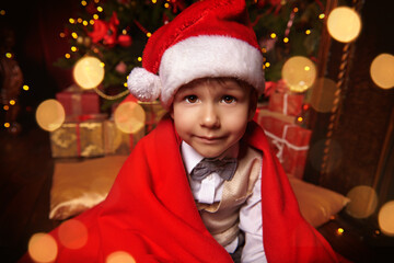 boy looks into the camera