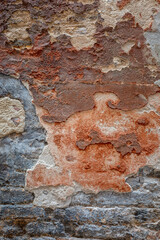 stone wall with rust background