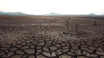 Global warming concept . Dry cracks in the land, serious water shortages. Drought concept.