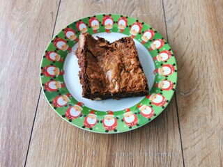 Christmas brownies on a plate with christmas decoration