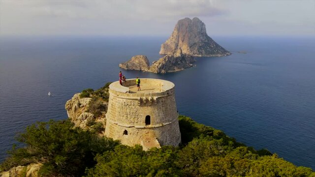 Amazing Torre del pirate (Pirate's Tower) and es vedra panoramic sea and mountain video shot with drone in Ibiza spain