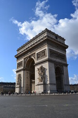 Fototapeta na wymiar Blue sky and victory monument. Paris. Victory monument and blue and cloudy sky background in Paris, France.