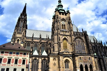 Prague and Czech Republic during sunny day. Cathedral St. Vitus, Prague, Czech Republic. Blue sky white cloud.