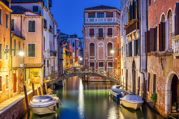 Lovely small canal in Venice at night