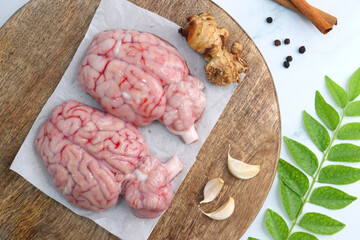 Uncooked Goat brain or Bheja.Perfect to cook bheja fry or bheja masala. Indian cooking ingredients. Copy space.
