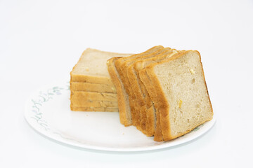 Slices of freshly baked bread kept on plate