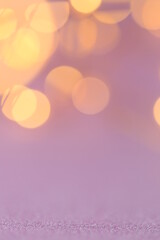 Wallpaper phone shining golden bokeh. Festive shiny bokeh rose gold background.Shining texture. purple background with golden light spots