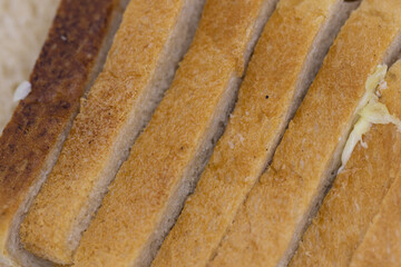 Close up Macro image of Slices of freshly baked bread kept on plate