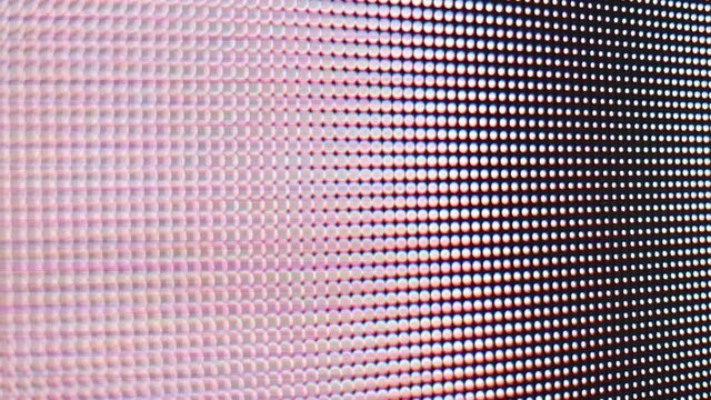 Diode screen with pixels, background, copy space. Monitor and illuminated