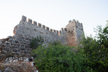 old fortress wall, watchtower. Bottom view. Ruins