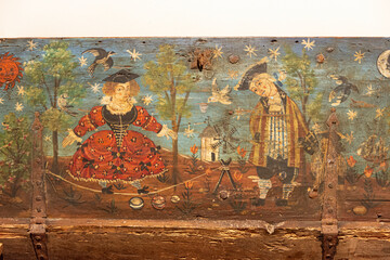 old religious drawing on the wooden chest